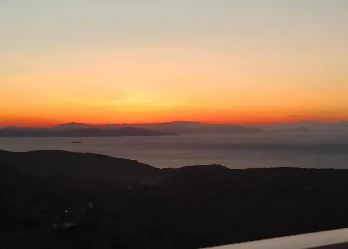 Enjoy A Wondeful Sunset From A Traditional House-Aggelos